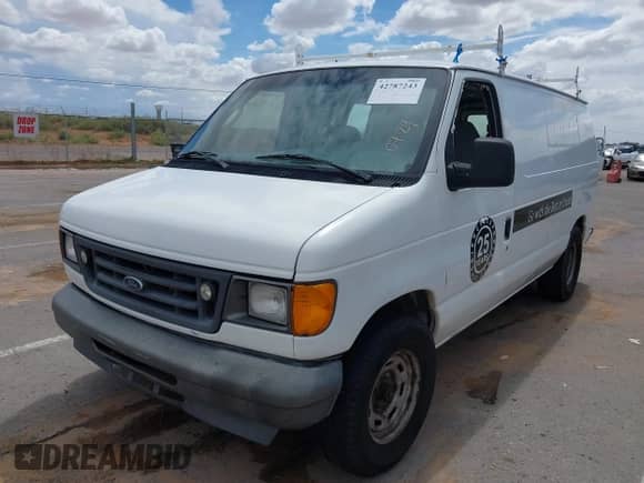 2005 Ford Econoline Cargo with VIN 1FTRE14W45HA26624, listed as a IAAI auction lot 42787243 with 490,973 mi miles and . Bid and sale history available at DreamBid. Image 2.