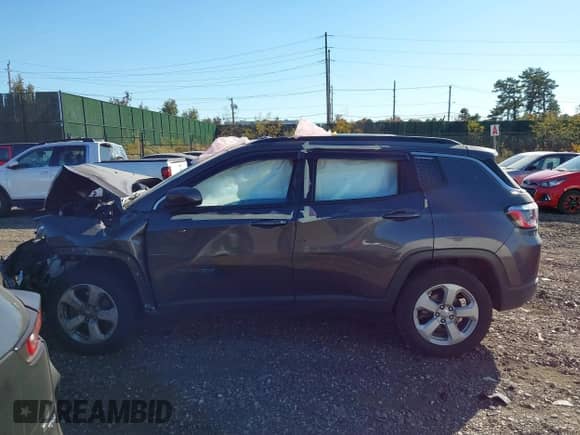 2021 Jeep Compass Latitude with VIN 3C4NJDBB8MT537958, listed as a IAAI auction lot 40705924 with 73,319 mi miles and . Bid and sale history available at DreamBid. Image 15.