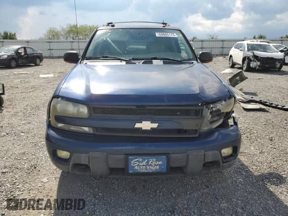 2004 Chevrolet TrailBlazer LT z VIN 1GNDT13S142393763, wystawiony jako Copart lot #69605175 z przebiegiem 220 952 mil mil oraz Szkoda całkowita • Salvage title. Historia ofert i sprzedaży dostępna na DreamBid. Obrazek 5.