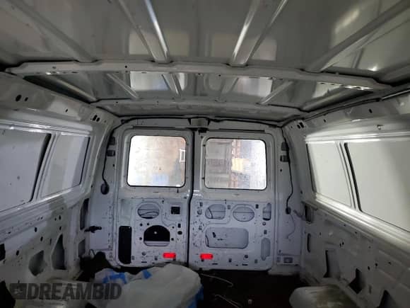 2013 Ford Econoline Cargo Commercial с VIN 1FTNE2EL7DDA00050, выставлен на аукционе Copart как лот 58330445 с пробегом 166 206 миль миль и Списание • Salvage title. История ставок и продаж доступна на DreamBid. Изображение 10.