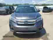 2021 Honda Pilot Touring 7-Passenger z VIN 5FNYF6H67MB060507, wystawiony jako Copart lot #68040985 z przebiegiem 68 639 mil mil oraz Szkoda całkowita • Salvage title. Historia ofert i sprzedaży dostępna na DreamBid. Obrazek 5.