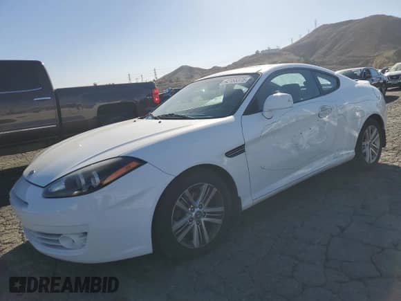 2008 Hyundai Tiburon GS с VIN KMHHM66D18U290091, выставлен на аукционе Copart как лот 42155375 с пробегом 141 681 миль миль и Списание • Salvage title. История ставок и продаж доступна на DreamBid. Изображение 1.