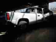 2004 Chevrolet Silverado 2500 LT с VIN 1GCGC23U94F259010, выставлен на аукционе Copart как лот 78248994 с пробегом 305 384 миль миль и Списание • Salvage title. История ставок и продаж доступна на DreamBid. Изображение 3.