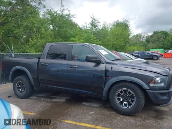 2015 Ram 1500 Rebel with VIN 1C6RR7YTXFS785507, listed as a IAAI auction lot 42172925 with 100,201 mi miles and . Bid and sale history available at DreamBid. Image 13.