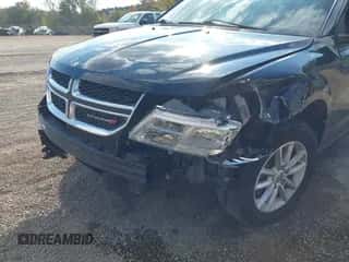 2014 Dodge Journey SXT with VIN 3C4PDCBG0ET141000, listed as a IAAI auction lot 43255379 with 199,750 mi miles and . Bid and sale history available at DreamBid. Image 6.