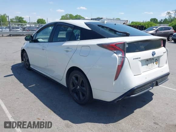 2017 Toyota Prius Two z VIN JTDKARFU4H3051645, wystawiony jako IAAI lot #41991804 z przebiegiem 301 338 mil mil oraz . Historia ofert i sprzedaży dostępna na DreamBid. Obrazek 3.
