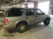 2000 Chevrolet Blazer LT with VIN 1GNDT13W1Y2282557, listed as a Copart auction lot 55560775 with 219,795 mi miles and Salvage title. Bid and sale history available at DreamBid. Image 3.