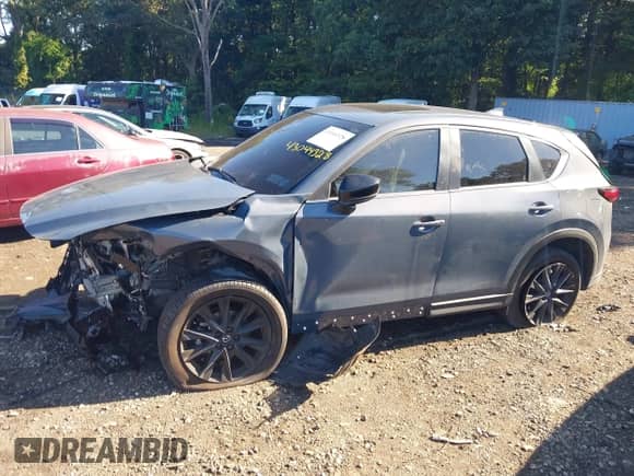 2025 Mazda CX-5 S Carbon Edition z VIN JM3KFBCM1S0584162, wystawiony jako IAAI lot #43044328 z przebiegiem 8 511 mil mil oraz . Historia ofert i sprzedaży dostępna na DreamBid. Obrazek 13.