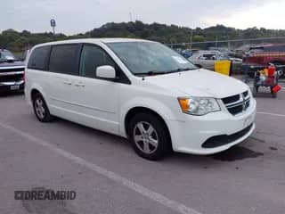 2013 Dodge Grand Caravan SXT with VIN 2C4RDGCG5DR502639, listed as a IAAI auction lot 43476224 with 242,039 mi miles and . Bid and sale history available at DreamBid. Image 1.