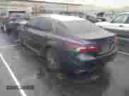 2023 Toyota Camry SE with VIN 4T1G11AK3PU753019, listed as a IAAI auction lot 43250757 with 34,297 mi miles and . Bid and sale history available at DreamBid. Image 3.