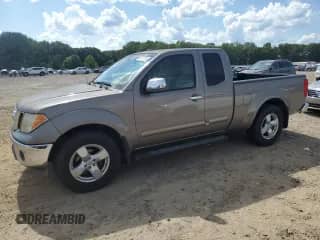 2008 Nissan Frontier SE with VIN 1N6AD06U28C408168, listed as a Copart auction lot 62821755 with 157,486 mi miles and Salvage title. Bid and sale history available at DreamBid. Image 1.