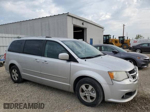 2011 Dodge Grand Caravan Crew with VIN 2D4RN5DG6BR689258, listed as a Copart auction lot 80556795 with 149,320 mi miles and Salvage title. Bid and sale history available at DreamBid. Image 4.