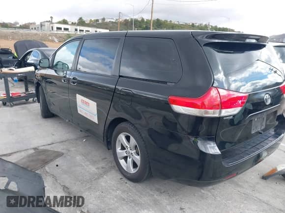 2014 Toyota Sienna L with VIN 5TDZK3DC3ES519412, listed as a IAAI auction lot 41732447 with Not provided miles and . Bid and sale history available at DreamBid. Image 3.