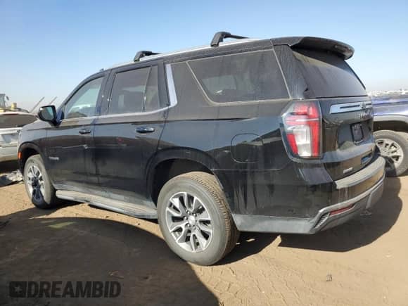 2021 Chevrolet Tahoe with VIN 1GNSKMKT8MR355007, listed as a Copart auction lot 76082323 with 48,498 mi miles and . Bid and sale history available at DreamBid. Image 2.