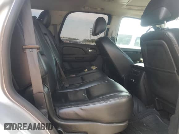 2014 Chevrolet Tahoe LTZ с VIN 1GNSKCE05ER233797, выставлен на аукционе Copart как лот 62817395 с пробегом 132 609 миль миль и Списание • Salvage title. История ставок и продаж доступна на DreamBid. Изображение 11.
