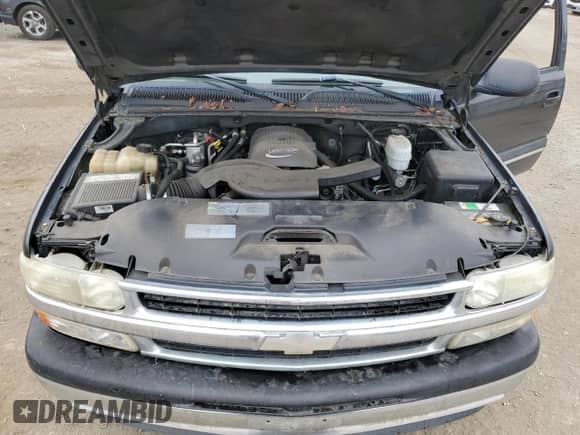 2005 Chevrolet Suburban LT z VIN 3GNEC16Z35G123374, wystawiony jako Copart lot #62396585 z przebiegiem 244 078 mil mil oraz Czysty tytuł • Clean title. Historia ofert i sprzedaży dostępna na DreamBid. Obrazek 12.