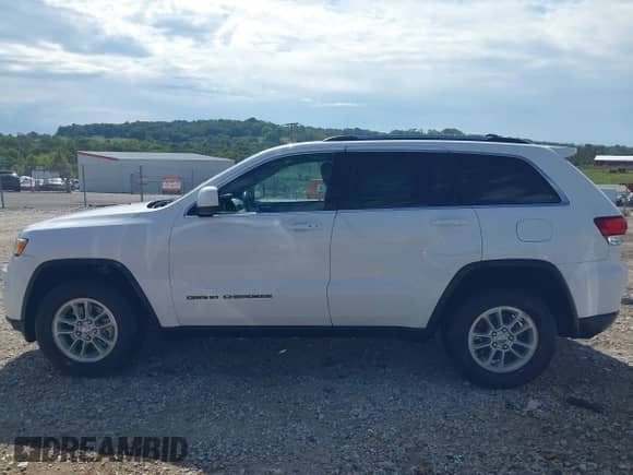 2020 Jeep Grand Cherokee Laredo E with VIN 1C4RJFAG4LC262853, listed as a IAAI auction lot 43261945 with 143,105 mi miles and . Bid and sale history available at DreamBid. Image 14.