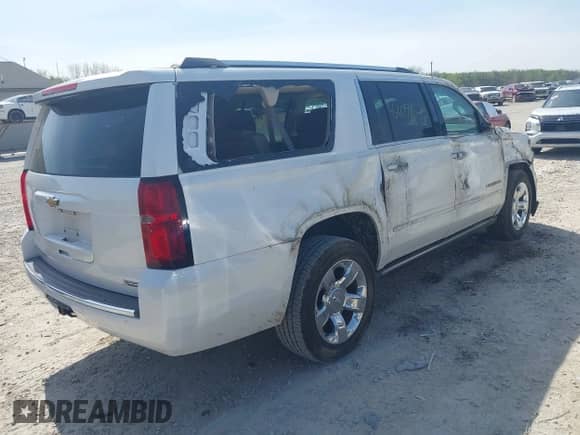 2018 Chevrolet Suburban Premier z VIN 1GNSKJKC9JR323192, wystawiony jako IAAI lot #42096522 z przebiegiem 148 240 mil mil oraz . Historia ofert i sprzedaży dostępna na DreamBid. Obrazek 4.