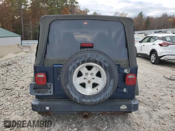2001 Jeep Wrangler Sport z VIN 1J4FA49S51P371578, wystawiony jako Copart lot #90417405 z przebiegiem 158 149 mil mil oraz Czysty tytuł • Clean title. Historia ofert i sprzedaży dostępna na DreamBid. Obrazek 6.