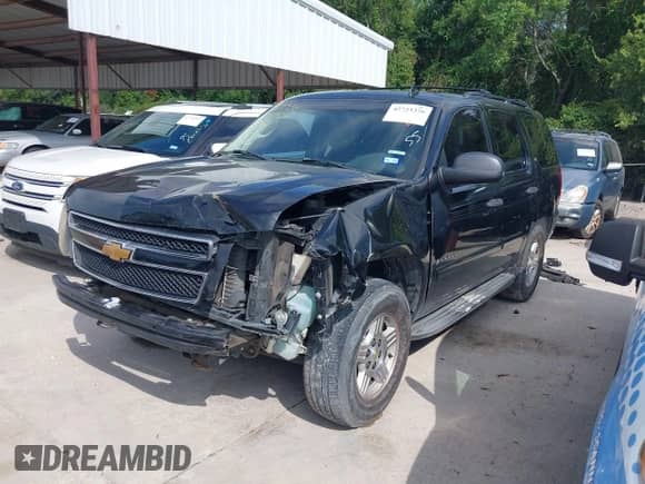 2007 Chevrolet Tahoe LS with VIN 1GNFC13CX7R423839, listed as a IAAI auction lot 42723376 with 264,345 mi miles and . Bid and sale history available at DreamBid. Image 2.