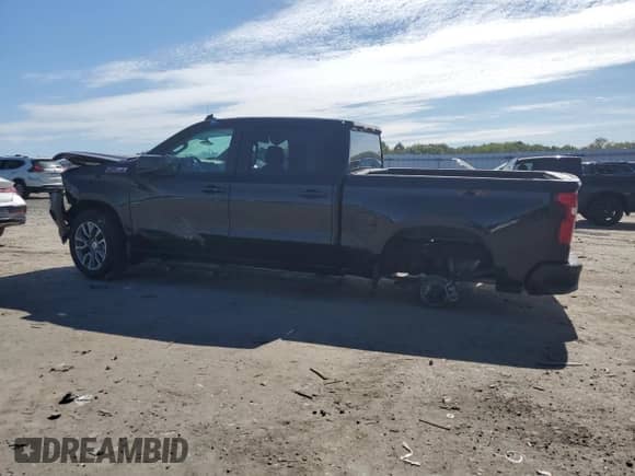 2025 Chevrolet Silverado 1500 RST with VIN 2GCUKEED2S1117154, listed as a Copart auction lot 70365665 with 10,939 mi miles and Salvage title. Bid and sale history available at DreamBid. Image 2.
