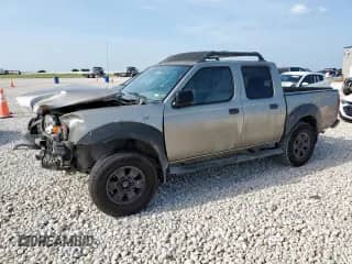 2001 Nissan Frontier XE with VIN 1N6ED27T51C357872, listed as a Copart auction lot 64646255 with 364,415 mi miles and Salvage title. Bid and sale history available at DreamBid. Image 1.
