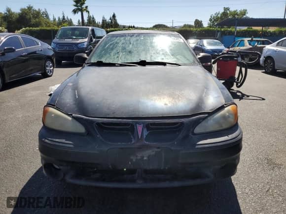2000 Pontiac Grand Am GT z VIN 1G2NW52E3YC553038, wystawiony jako Copart lot #67668845 z przebiegiem 215 693 mil mil oraz Czysty tytuł • Clean title. Historia ofert i sprzedaży dostępna na DreamBid. Obrazek 5.