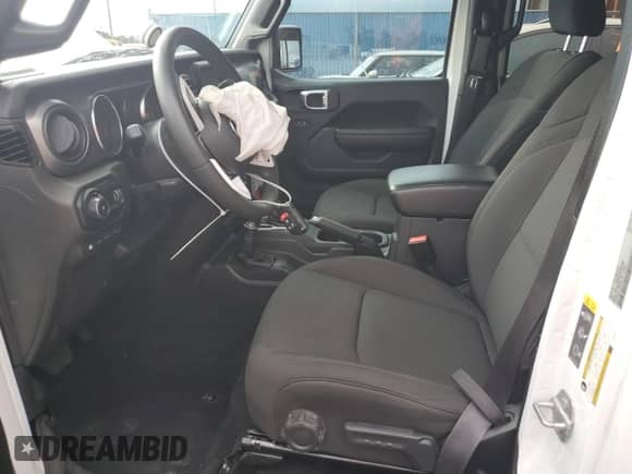 2023 Jeep Wrangler with VIN 1C4JJXN60PW663065, listed as a Copart auction lot 61904565 with 34,831 mi miles and Non repairable. Bid and sale history available at DreamBid. Image 7.