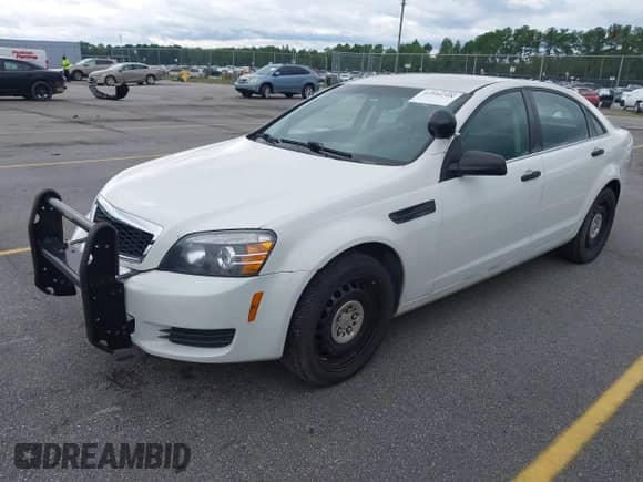 2013 Chevrolet Caprice Police Police z VIN 6G1MK5U25DL822345, wystawiony jako IAAI lot #42940768 z przebiegiem 97 408 mil mil oraz . Historia ofert i sprzedaży dostępna na DreamBid. Obrazek 2.