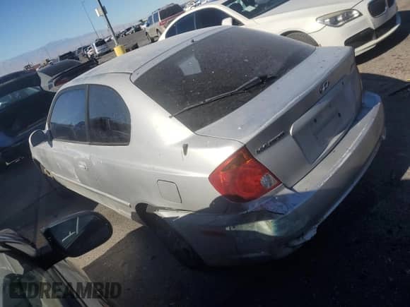 2003 Hyundai Accent GL с VIN KMHCG35C73U263320, выставлен на аукционе Copart как лот 88956145 с пробегом 191 208 миль миль и Списание • Salvage title. История ставок и продаж доступна на DreamBid. Изображение 2.