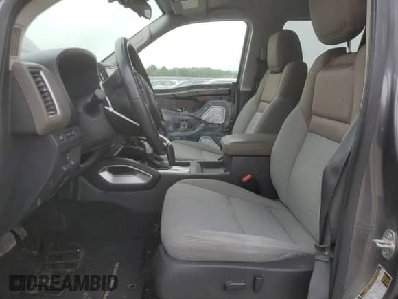 2023 Nissan Frontier Pro-4X with VIN 1N6ED1EK9PN621452, listed as a Copart auction lot 67550325 with 64,850 mi miles and Salvage title. Bid and sale history available at DreamBid. Image 7.