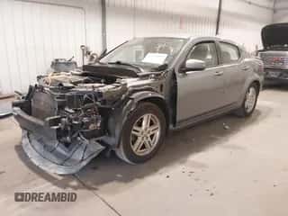 2010 Dodge Avenger R/T with VIN 1B3CC5FB2AN164818, listed as a IAAI auction lot 43230953 with 165,249 mi miles and . Bid and sale history available at DreamBid. Image 2.