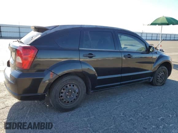 2007 Dodge Caliber with VIN 1B3HB28BX7D104403, listed as a Copart auction lot 69458045 with 202,184 mi miles and Salvage title. Bid and sale history available at DreamBid. Image 3.