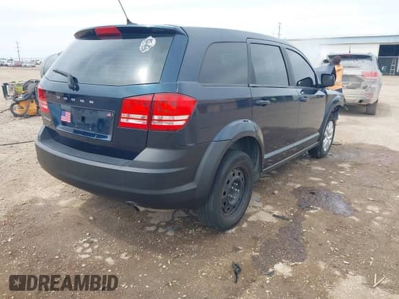 2014 Dodge Journey SE z VIN 3C4PDCAB0ET102221, wystawiony jako IAAI lot #42032889 z przebiegiem 158 964 mil mil oraz . Historia ofert i sprzedaży dostępna na DreamBid. Obrazek 4.