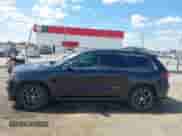 2015 Jeep Grand Cherokee SRT with VIN 1C4RJFDJ4FC853745, listed as a IAAI auction lot 43327828 with 68,614 mi miles and . Bid and sale history available at DreamBid. Image 14.