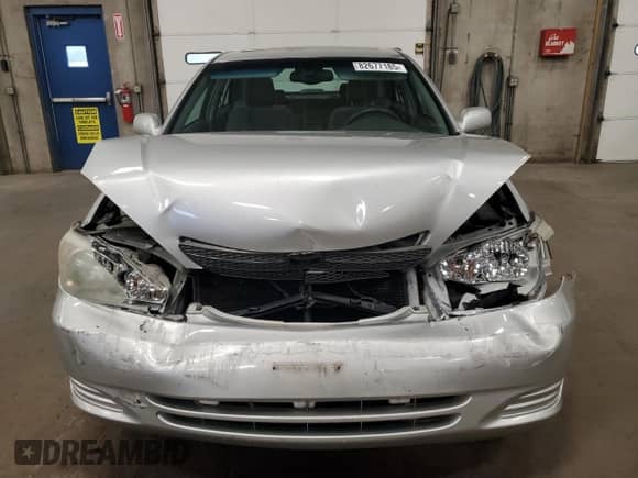 2002 Toyota Camry LE с VIN 4T1BE32K62U581375, выставлен на аукционе Copart как лот 82677185 с пробегом 163 800 миль миль и Списание • Salvage title. История ставок и продаж доступна на DreamBid. Изображение 5.