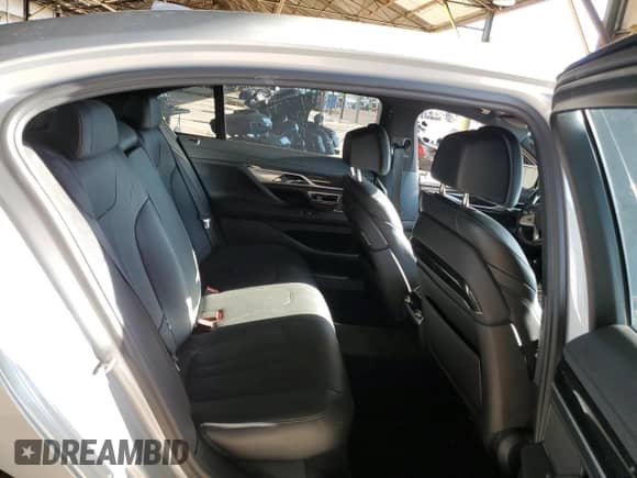 2017 BMW 7 Series 740i with VIN WBA7E2C57HG740275, listed as a Copart auction lot 68719665 with 114,599 mi miles and Salvage title. Bid and sale history available at DreamBid. Image 10.