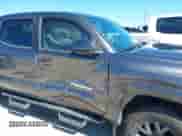 2021 Toyota Tacoma SR5 with VIN 5TFAZ5CN0MX106119, listed as a IAAI auction lot 42812735 with 70,968 mi miles and . Bid and sale history available at DreamBid. Image 6.
