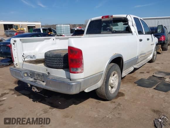 2003 Dodge 2500 ST z VIN 3D7KA28C43G733285, wystawiony jako IAAI lot #41762538 z przebiegiem 258 177 mil mil oraz . Historia ofert i sprzedaży dostępna na DreamBid. Obrazek 4.