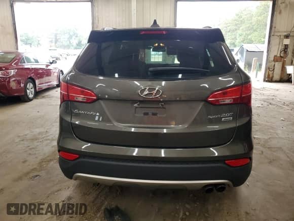 2014 Hyundai Santa Fe с VIN 5XYZUDLA7EG201421, выставлен на аукционе Copart как лот 81732465 с пробегом 125 052 миль миль и Списание • Salvage title. История ставок и продаж доступна на DreamBid. Изображение 6.