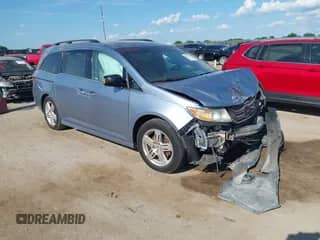 2012 Honda Odyssey Touring с VIN 5FNRL5H9XCB063563, выставлен на аукционе IAAI как лот 43005004 с пробегом 139 469 миль миль и . История ставок и продаж доступна на DreamBid. Изображение 1.