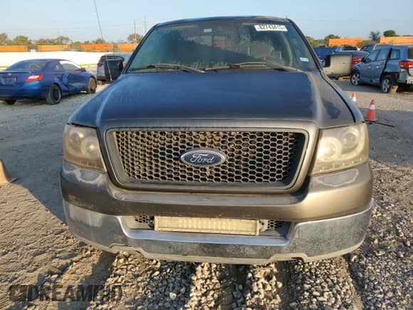 2004 Ford F-150 XL with VIN 1FTPX12504NA52326, listed as a Copart auction lot 82743415 with 254,627 mi miles and Clean title. Bid and sale history available at DreamBid. Image 5.