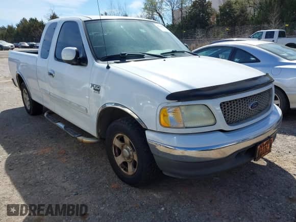 2003 Ford F-150 XL with VIN 1FTRX17W03NA37401, listed as a IAAI auction lot 41724466 with 350,336 mi miles and . Bid and sale history available at DreamBid. Image 1.