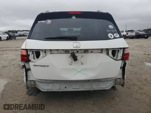 2013 Honda Odyssey EX-L z VIN 5FNRL5H69DB076280, wystawiony jako Copart lot #89840545 z przebiegiem 155 405 mil mil oraz Szkoda całkowita • Salvage title. Historia ofert i sprzedaży dostępna na DreamBid. Obrazek 6.