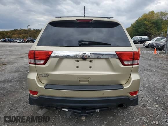 2012 Jeep Grand Cherokee Laredo z VIN 1C4RJFAG0CC156397, wystawiony jako Copart lot #87400775 z przebiegiem 165 192 mil mil oraz Szkoda całkowita • Salvage title. Historia ofert i sprzedaży dostępna na DreamBid. Obrazek 6.