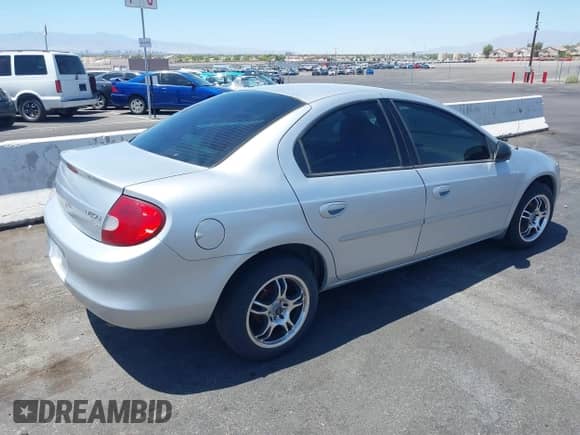 2002 Dodge Neon SE with VIN 1B3AS46C22D640554, listed as a IAAI auction lot 42871122 with 162,958 mi miles and . Bid and sale history available at DreamBid. Image 4.