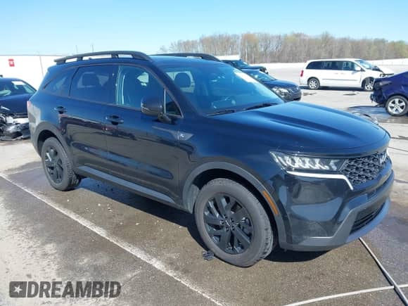 2023 Kia Sorento X-Line S z VIN 5XYRLDLC1PG165863, wystawiony jako IAAI lot #41952392 z przebiegiem 74 827 mil mil oraz . Historia ofert i sprzedaży dostępna na DreamBid. Obrazek 1.