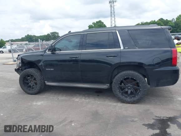 2016 Chevrolet Tahoe LT z VIN 1GNSCBKC6GR141624, wystawiony jako IAAI lot #42314863 z przebiegiem 237 446 mil mil oraz . Historia ofert i sprzedaży dostępna na DreamBid. Obrazek 14.