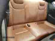 2010 Hyundai Genesis Coupe z VIN KMHHU6KH2AU037599, wystawiony jako Copart lot #90097635 z przebiegiem 126 282 mil mil oraz Szkoda całkowita • Salvage title. Historia ofert i sprzedaży dostępna na DreamBid. Obrazek 10.