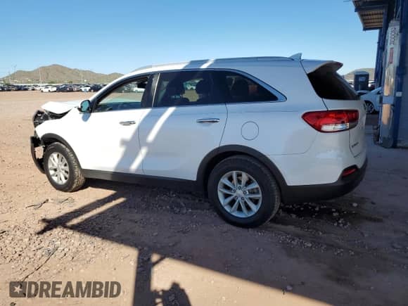 2018 Kia Sorento LX z VIN 5XYPG4A3XJG413047, wystawiony jako Copart lot #82176955 z przebiegiem 118 651 mil mil oraz Szkoda całkowita • Salvage title. Historia ofert i sprzedaży dostępna na DreamBid. Obrazek 2.